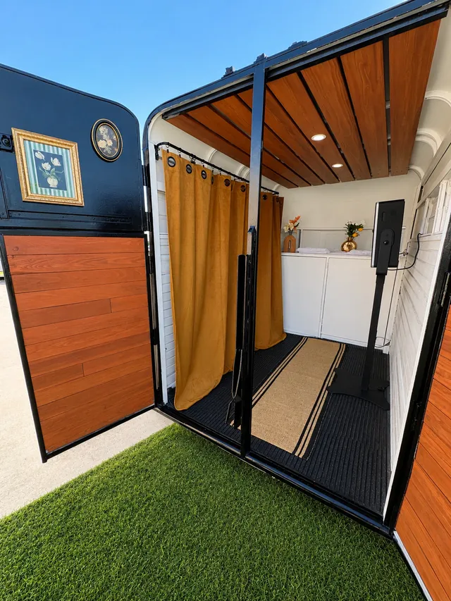 Warm wood interior of the photobooth