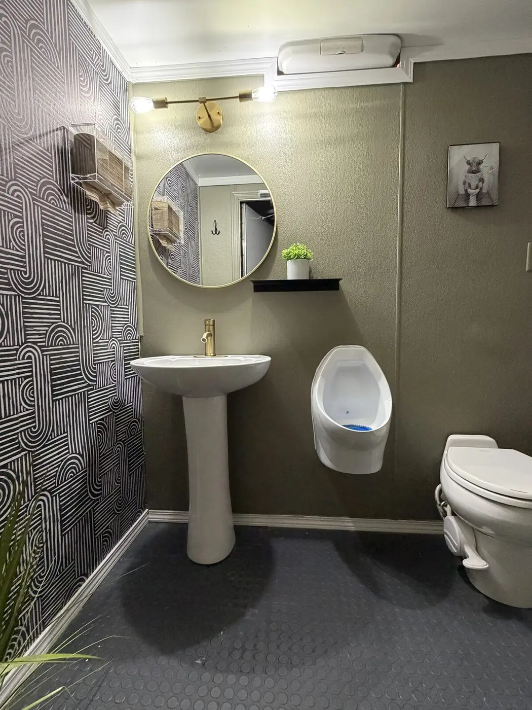 Oso double restroom suite, men's side with green walls